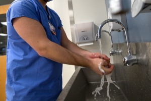 Medical student washing his hands
