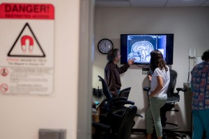 doctors looking at a brain scan
