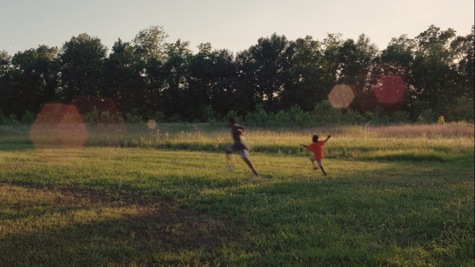photo of children playing soccer