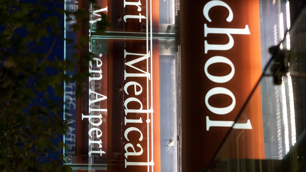 medical school signs lit up at night