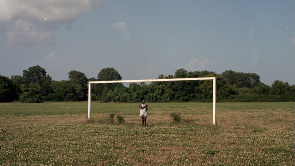 photo of a child near a soccer goal